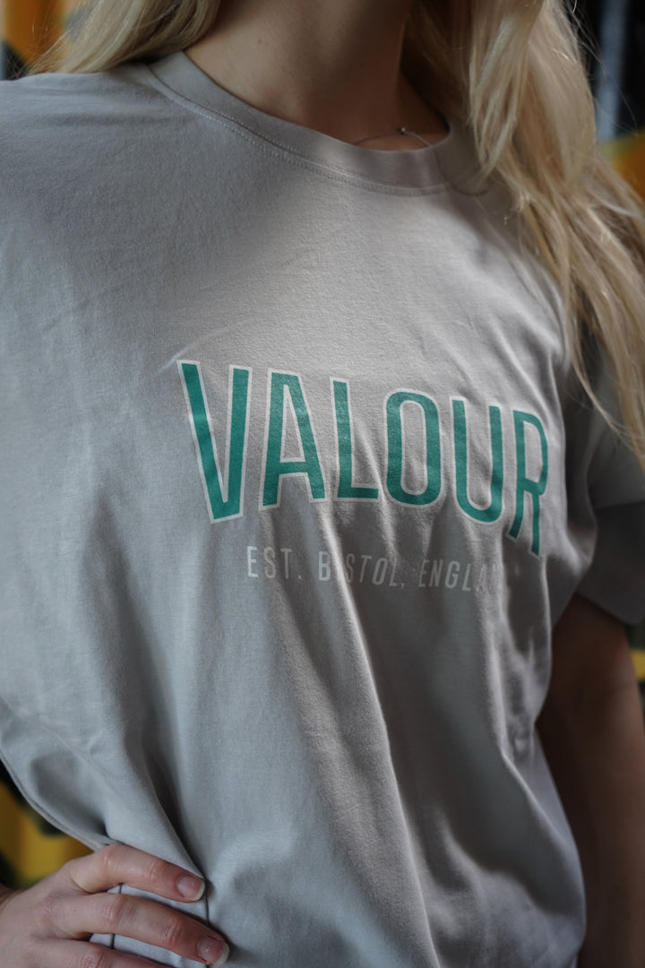 woman wearing light grey valour gym shirt