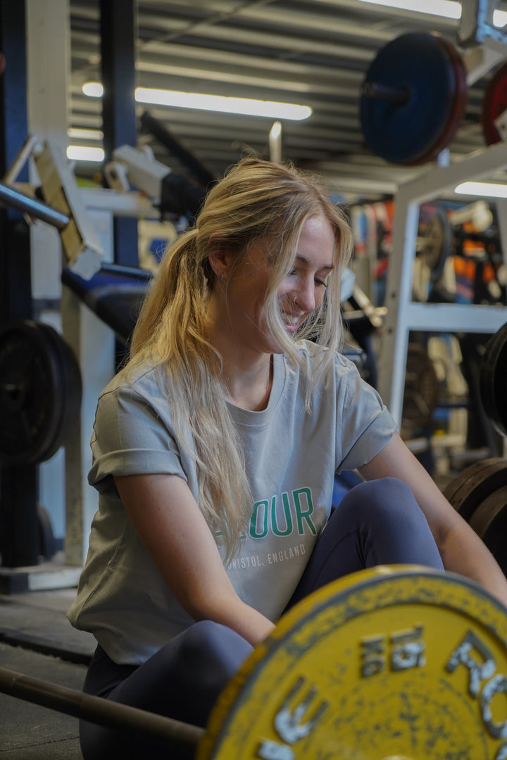 woman wearing light grey valour gym shirt