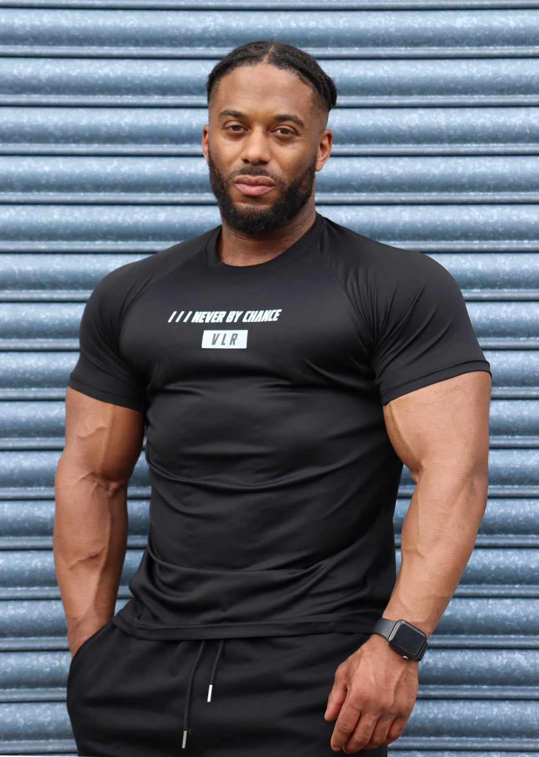 bodybuilder in tech training shirt