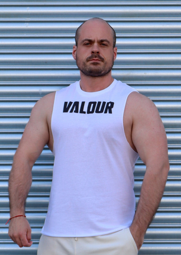 bodybuilder in white vest